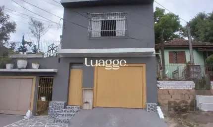 Casa com 8 quartos à venda na Rua Evangelista Francisco da Silva, 309, Cavalhada, Porto Alegre