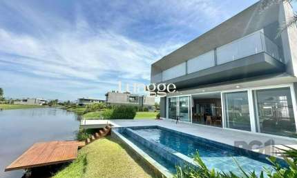Sobrado Beira Lago com piscina e Deck com 457m² e 5 suítes no Condomínio Sense em Xangri-lá