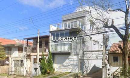 Sobrado de Alto Padrão na Vila Nova – 3 Dormitórios e 170 m² de Conforto e Estilo!