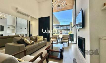 Casa em condomínio fechado com 4 quartos à venda na Rua Rio Divisa, 105, Atlântida, Xangri-Lá