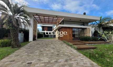 Casa em condomínio fechado com 4 quartos à venda na Avenida Jaçanã, 1028, Atlântida, Xangri-Lá