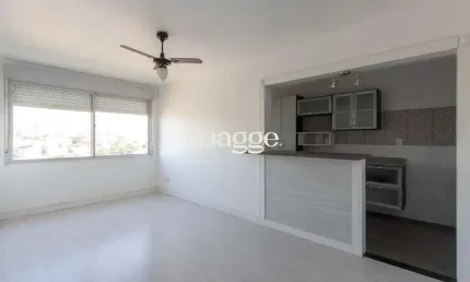 Apartamento semimobiliado à venda no bairro cristal, 2 dormitórios, 2 banheiros, 1 vaga coberta e vista livre para o guaíba