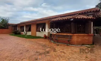 Casa com 5 quartos à venda na Rua Cariri, 261, Vila Assunção, Porto Alegre