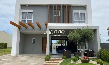 Casa em condomínio fechado com 4 quartos à venda na Rua Rio Divisa, 94, Atlântida, Xangri-Lá