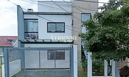 Excelente casa de alvenaria, 4 dormitórios, 2 suítes e 2 vagas de garagem.