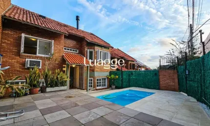 Casa na vila conceição, 3 dormitórios, 1 suíte, churrasqueira, lareira, 4 vagas, piscina aquecida e vista perene para o rio.