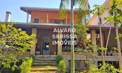 Casa canto dos pássaros, com 4 suítes e mais um quarto reversível. salas de jantar, lareira e estar cozinha e lavanderia escritorio. 480m2.at 380m2.ac