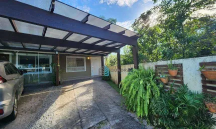 Casa com 3 dormitórios para alugar, 136 m² por R$ 6.085,37/mês - Santa Mônica - Florianópolis/SC