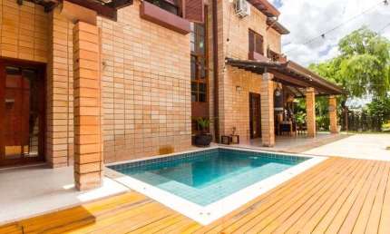 Casa estilo praia à venda no Condomínio Alphaville 9 em Santana de Parnaíba - SP