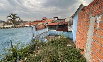 TERRENO COM CASA NOS FUNDOS NA VILA ITAPOAN -GUARULHOS