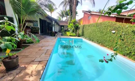 Casa Térrea em condomínio fechado de alto padrão na região da Praia de Pernambuco no Guarujá!