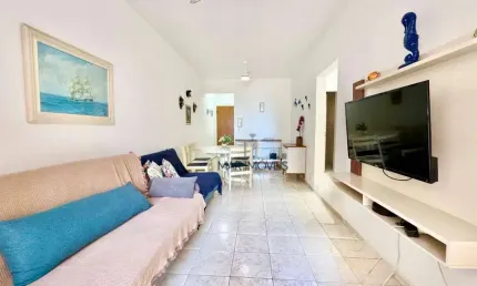 Apartamento com vista do mar, 2 dormitórios à venda, 80 m² por R$ 450.000 - Pitangueiras - Guarujá/SP