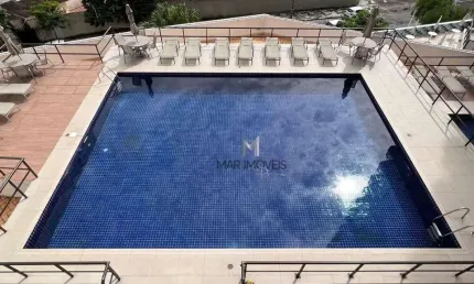 Apartamento em excelente localização com vista panorâmica da praia do Tombo no Guarujá!