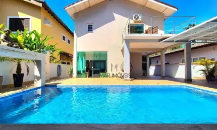 Casa em condomínio fechado, excelente localização na região da praia de pernambuco no guarujá!
