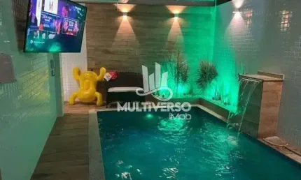CASA SOBREPOSTA TÉRREA NA PONTA DA PRAIA COM PORTEIRA FECHADA