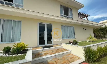 Casa com 4 dormitórios à venda, 518 m² por R$ 3.500.000,00 - Condomínio Flora Rica - Peruíbe/SP
