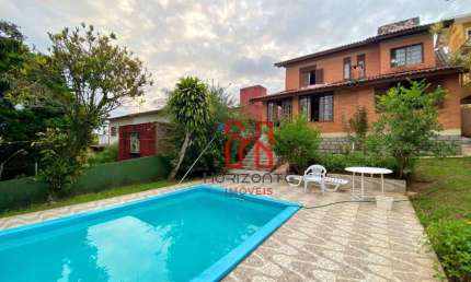 Casa com 3 dormitórios à venda, 300 m² por R$ 2.800.000,00 - Cacupé - Florianópolis/SC