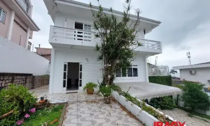 Casa com 4 quartos para alugar na Rua Papa João XXIII, 262, Coqueiros, Florianópolis, 270 m2 por R$ 10.000