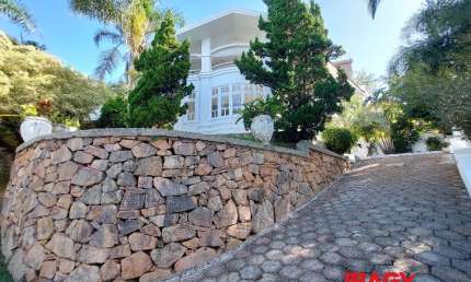 Casa em condomínio fechado com 4 quartos para alugar na Rua das Laranjeiras, 1122, Roçado, São José, 480 m2 por R$ 12.500