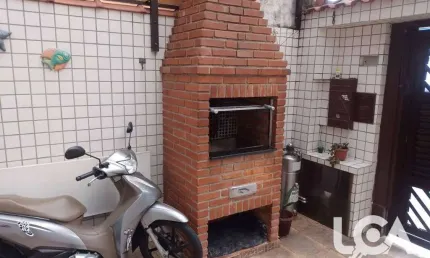 Casa com 2 dormitórios à venda por R$ 585.000 - Macuco - Santos/SP