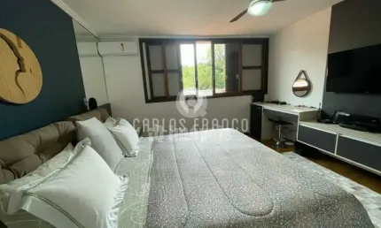 Maravilhosa casa para venda com piscina , sauna e jardim.