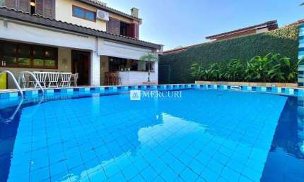Casa com 4 dormitórios à venda, 250 m² por R$ 2.000.000,00 - Balneário Praia do Pernambuco - Guarujá/SP