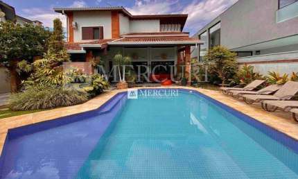 Casa no Guarujá, Condomínio Fechado, Jardim Acapulco, 3 suítes.
