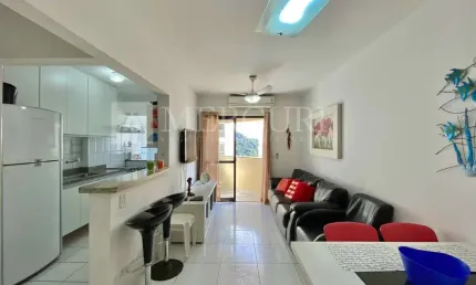 Apartamento no guarujá, pitangueiras, 2 quartos, sala para 2 ambientes e sacada com vista urbana - mercuri imóveis - imobiliária no guarujá