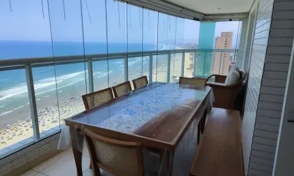 Apartamento frente mar com sacada gourmet e 3 suítes no bairro guilhermina na praia grande