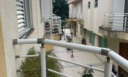 Sobrado com 3 dormitórios à venda, 188 m² por R$ 720.000,00 - Vila Scarpelli - Santo André/SP