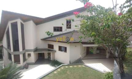 Casa em Condomínio Fechado em Arujázinho I, II e III com 405m², 5 quartos, 2 suítes e 4 banheiros. À venda por R$ 2.800.000. Encontre seu lar perfeito agora!