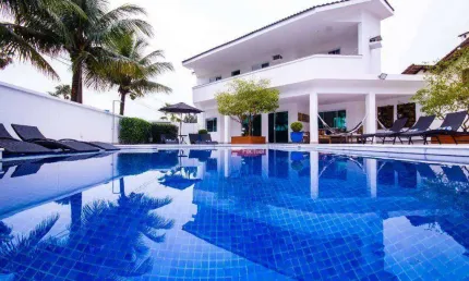 Casa com 4 dormitórios à venda, 395 m² por R$ 3.900.000,00 - Acapulco - Guarujá/SP
