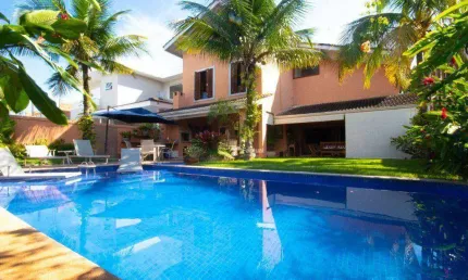 Casa com 4 dormitórios à venda, 426 m² por R$ 3.100.000,00 - Acapulco - Guarujá/SP