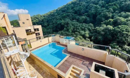 Cobertura com 4 dormitórios à venda, 370 m² por R$ 1.500.000,00 - Pitangueiras - Guarujá/SP
