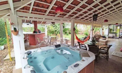 Casa com 3 suítes à venda, 203 m² por R$ 1.700.000 - Park Lane - Guarujá/SP