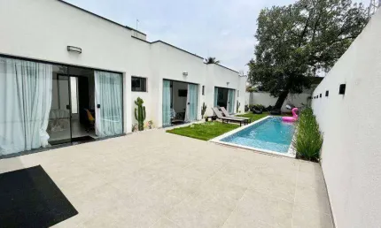 Casa com 3 dormitórios à venda, 158 m² por R$ 1.250.000,00 - Praia de Pernambuco - Guarujá/SP