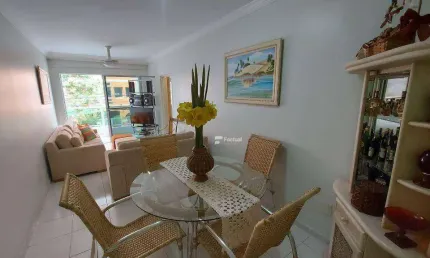 Espaçoso apartamento com sacada e 03 dormitórios na praia da enseada!! lado praia!! churrasqueira e serviço de praia!! ótima localização!!