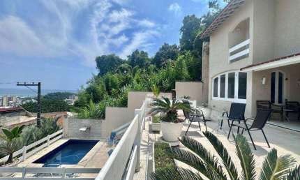 Casa com 3 dormitórios à venda, 300 m² por R$ 1.500.000,00 - Enseada - Guarujá/SP