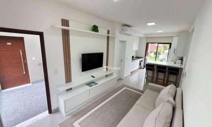 Village com 2 dormitórios à venda, 68 m²  - Riviera de São Lourenço - Bertioga/SP