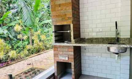 Village com 2 dormitórios à venda, 68 m² - Riviera de São Lourenço - Bertioga/SP