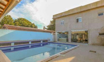 Casa com 5 dormitórios à venda, 290 m² por R$ 1.500.000,00 - Praia de Pernambuco - Guarujá/SP