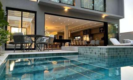 Casa com 6 dormitórios à venda, 420 m² - Riviera de São Lourenço - Bertioga/SP