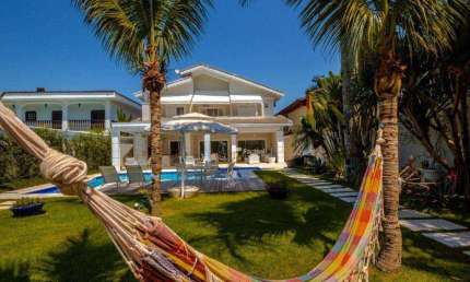Casa com 6 dormitórios à venda, 400 m² por R$ 3.800.000,00 - Acapulco - Guarujá/SP