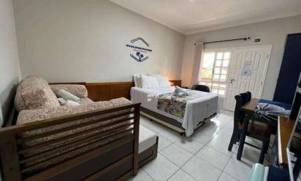 Village com 1 dormitório à venda, 46 m²  - Riviera de São Lourenço - Bertioga/SP