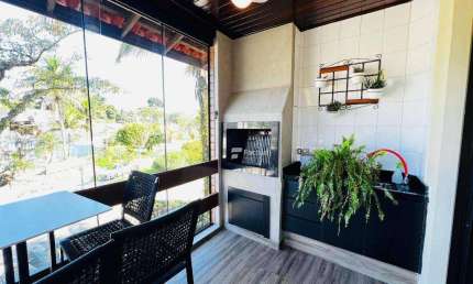 Village com 1 dormitório à venda, 50 m² - Riviera de São Lourenço - Bertioga/SP