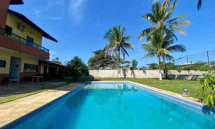 Casa com 3 dormitórios, 206 m² - venda por R$ 1.484.000,00 ou aluguel por R$ 9.600,00/mês - Praia de Pernambuco - Guarujá/SP