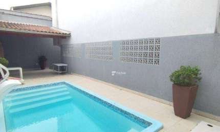 Village com 2 dormitórios à venda, 107 m² por R$ 430.000,00 - Enseada - Guarujá/SP