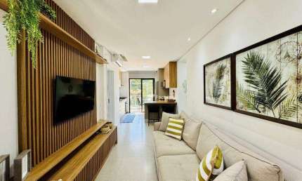 Village com 2 dormitórios à venda, 68 m² - Riviera de São Lourenço - Bertioga/SP