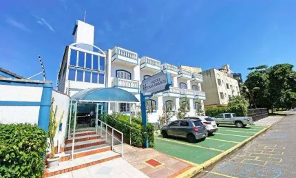 Hotel com 39 dormitórios à venda por R$ 10.000.000,00 - Enseada - Guarujá/SP