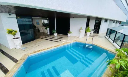 Apartamento a venda no Guarujá - alto padrão com lazer privativo e vista deslumbrante para o mar.